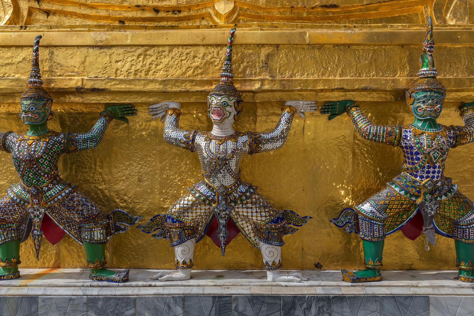 Yaksha guardians on the golden chedi at Wat Phra Kaew, inside the Grand Palace